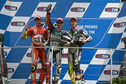 Podio: secondo posto Andrea Iannone, Ducati Team, il vincitore Jorge Lorenzo e terzo posto Valentino