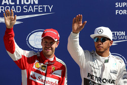 Poleman Lewis Hamilton, Mercedes AMG F1 Team e terzo posto Sebastian Vettel, Ferrari