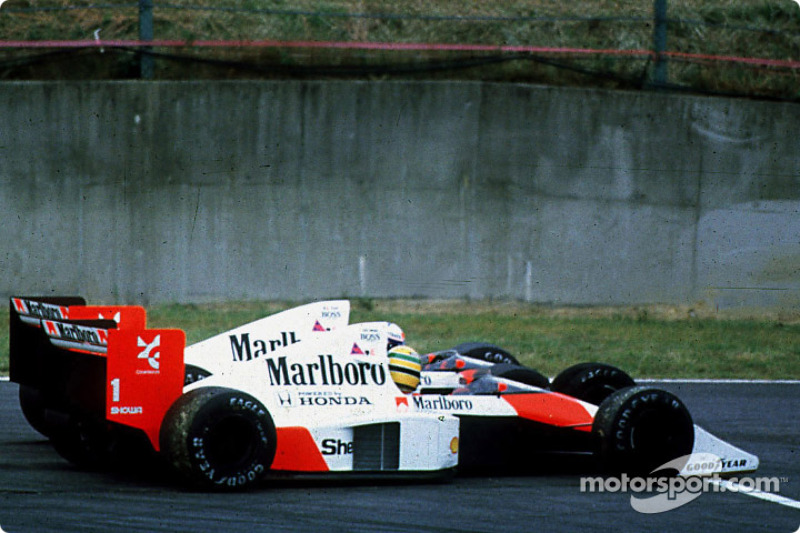 The infamous crash of Ayrton Senna and Alain Prost on lap 46