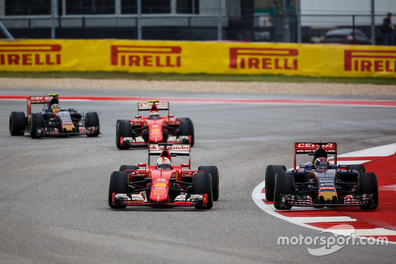 Sebastian Vettel, Ferrari SF15-T and Max Verstappen, Scuderia Toro Rosso STR10 battle for position