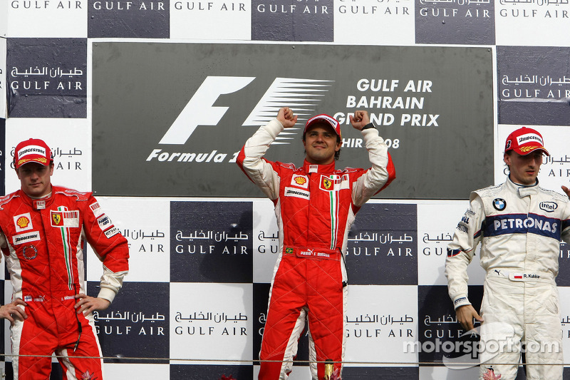 Podio: ganador de la carrera Felipe Massa, el segundo lugar Kimi Raikkonen, y el tercer lugar Robert