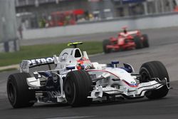 Robert Kubica, BMW Sauber F1 Team, F1.08 and Kimi Raikkonen, Scuderia Ferrari, F2008