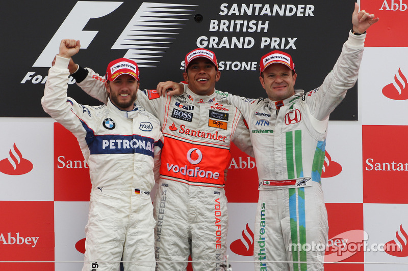 Podium: race winner Lewis Hamilton with second place Nick Heidfeld and third place Rubens Barrichello