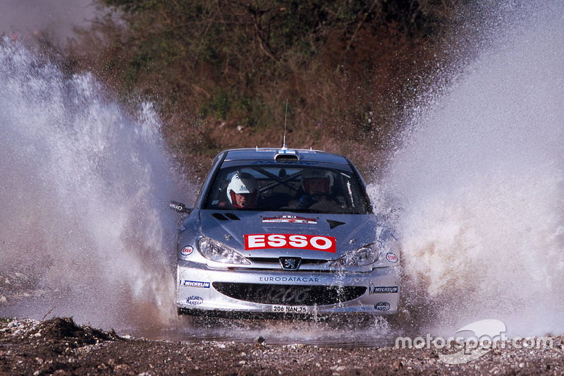 Marcus Gronholm, dan Timo Rautiainen, Peugeot Sport Peugeot 206 WRC