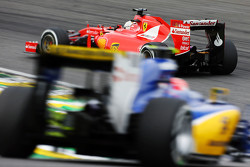 Sebastian Vettel, Ferrari SF15-T leads Felipe Nasr, Sauber C34