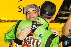 Victory lane: race winner and 2015 NASCAR Sprint Cup series champion Kyle Busch, Joe Gibbs Racing Toyota congratulated by Jeff Gordon, Hendrick Motorsports Chevrolet