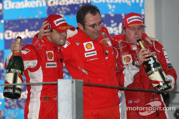 Felipe Massa, Stefano Domenicali y Kimi Räikkönen en Brasil 2008
