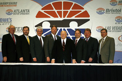 SMI Chairman and CEO Bruton Smith poses with General Managers Jeff Byrd, Eddie Gossage, Steve Page, Ed Clark, Marcus Smith, Jerry Gappens, and Chris Powell, from each track owned by SMI