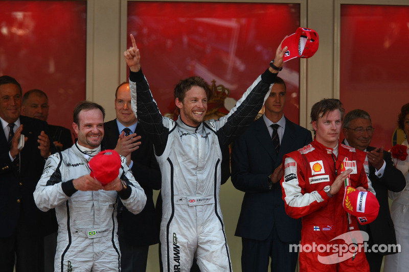 1st place Jenson Button, Brawn GP with 2nd place Rubens Barrichello, Brawn GP and 3rd place Kimi Rai