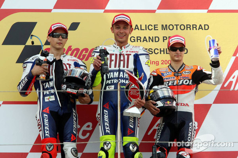 Podium: race winner Valentino Rossi, Fiat Yamaha Team, second place Jorge Lorenzo, Fiat Yamaha Team,